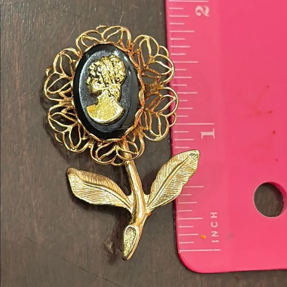 Intricate Gold and Black Flower Cameo Brooch